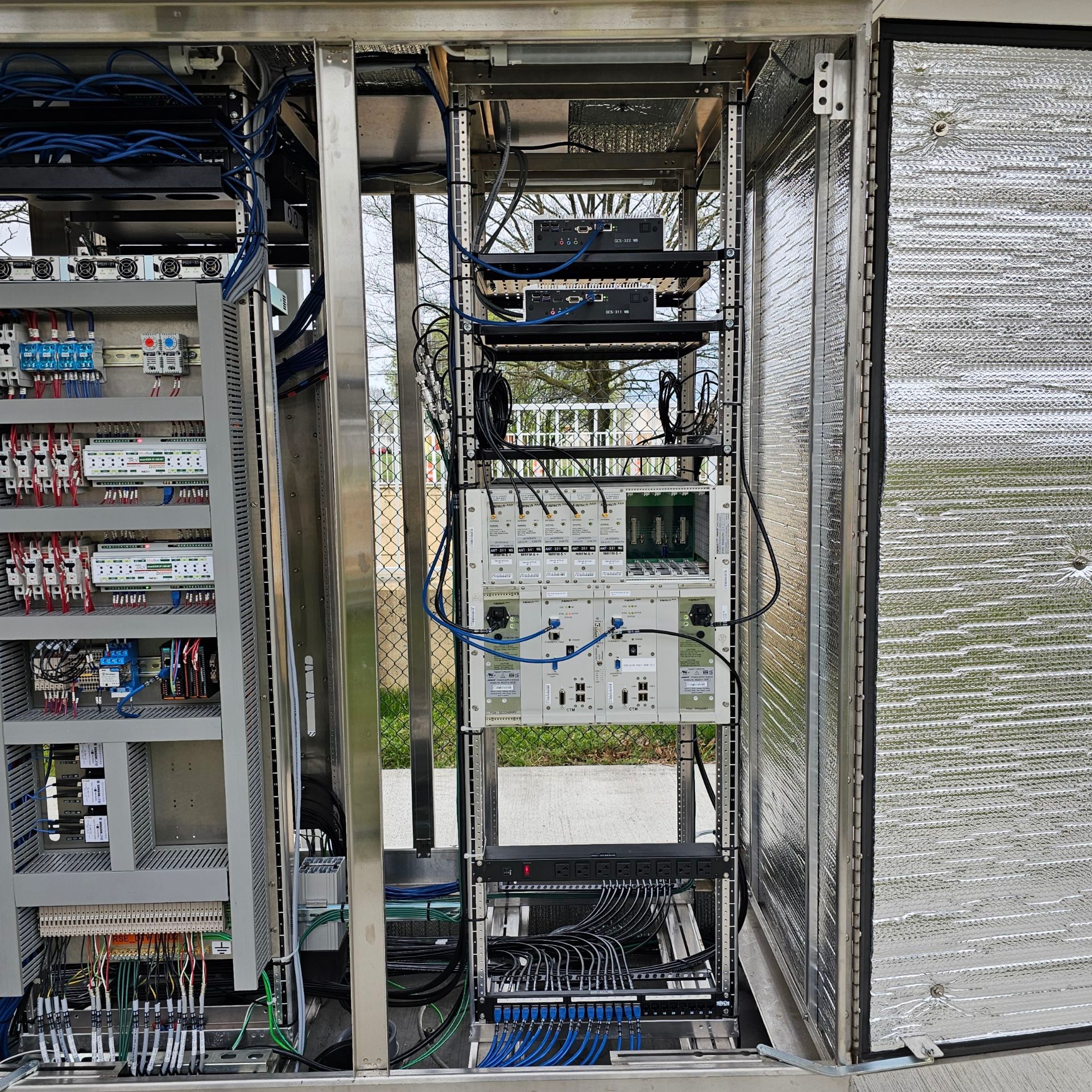 Industrial control cabinet interior — distribution, breakers, and signal gear installed by ELEC LLC